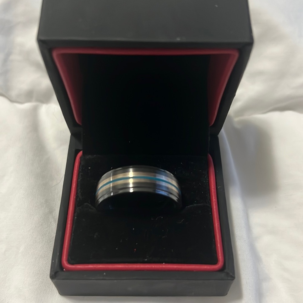 Size 10 custom made Black Zirconium ring. Details of ring in pictures.